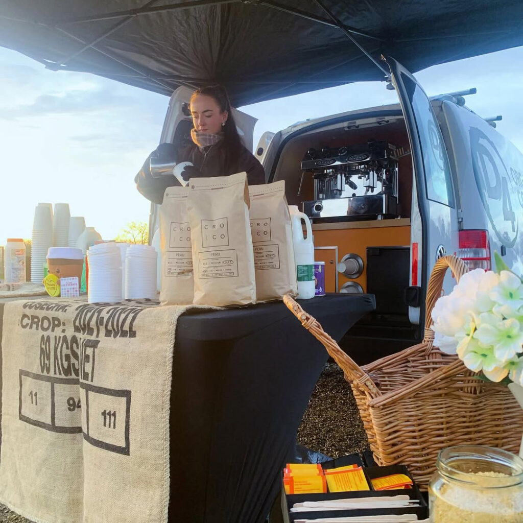 D4 Coffee mobile barista serving coffee